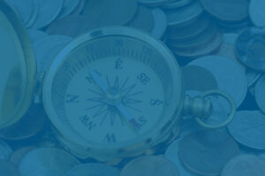Compass in money to illustrate wealth gap and business planning concept
