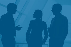 Silhouettes of business team talking - stagflation concept
