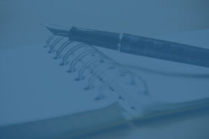 Pen and ledger to represent California tax planning.