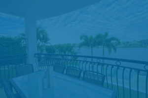 Vacation rental property outdoor patio with waterfront view