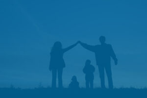 Family silhouette forming house. Child Tax Credit concept.