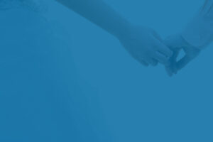 Married couple holding hands - spousal IRA concept