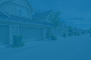 Row of residential houses, representing multi-family investments for real estate.