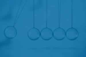 Newton's cradle, abstract tax planning concept for NIIT.