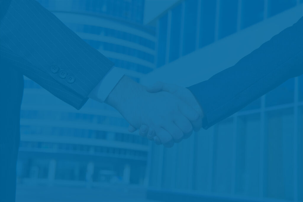 Handshake, representing buy-sell agreement between business co-owners